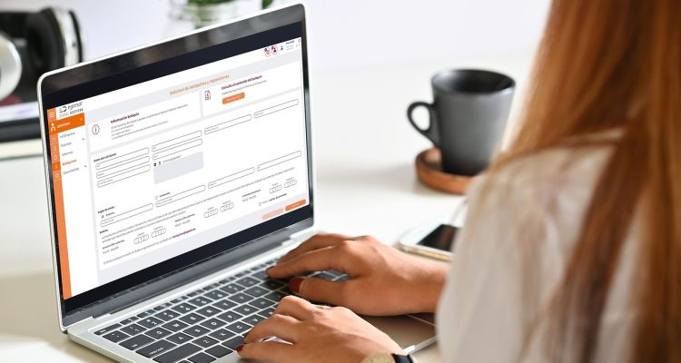 Business people using a laptop screen mockup in a meeting