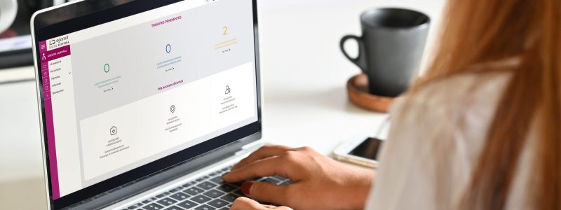 Business people using a laptop screen mockup in a meeting